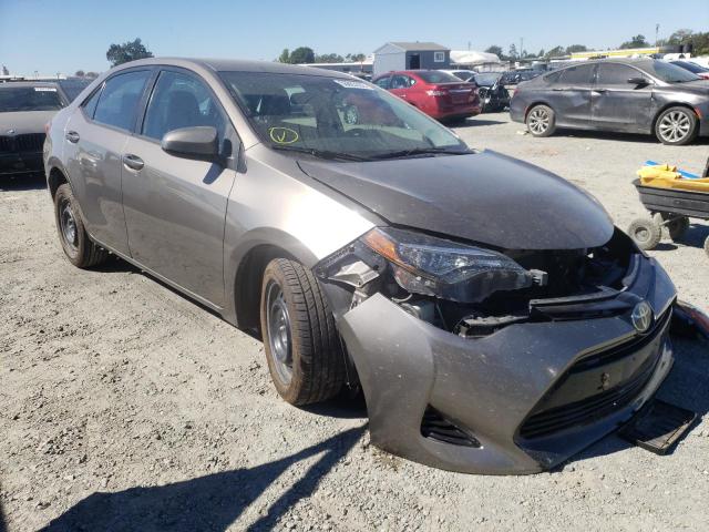 TOYOTA COROLLA L 2019 with VIN 5YFBURHE7KP865624 - Photo from auction
