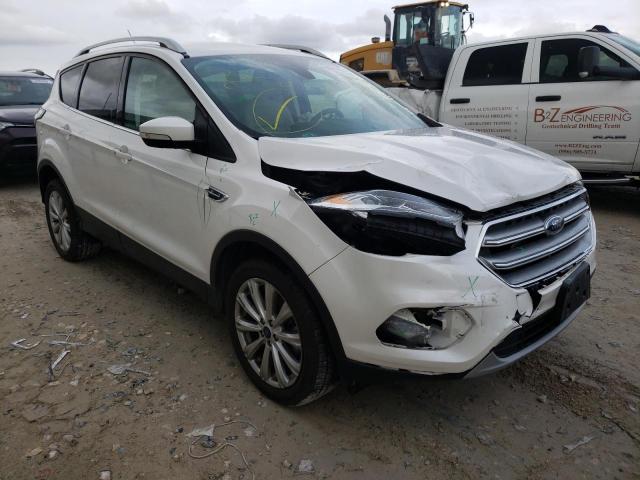 FORD ESCAPE TIT 2017 with VIN 1FMCU0J90HUD84473 - Photo from auction