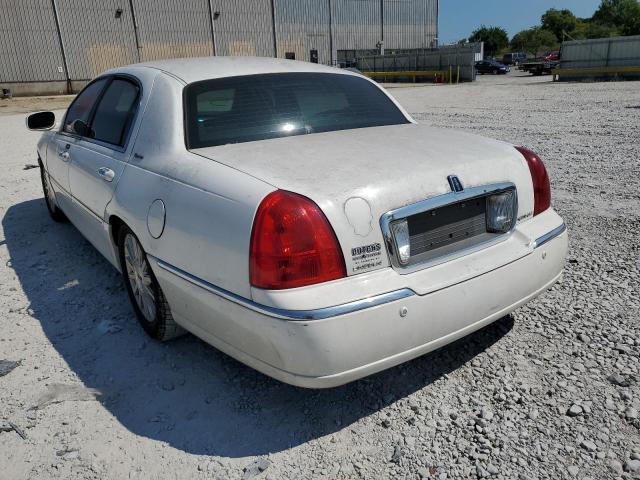 Photo 3 from auction – 2004 LINCOLN TOWN CAR E with VIN 1LNHM81W84Y632840
