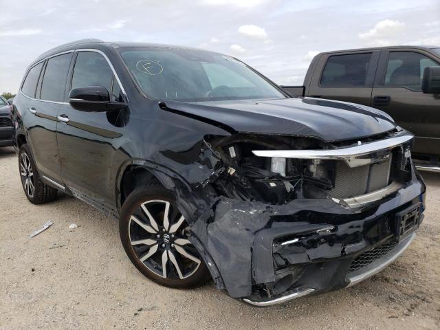 HONDA PILOT TOUR 2019 with VIN 5FNYF5H9XKB030337 - Photo from auction