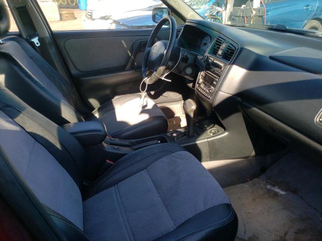Photo 5 from auction – 2002 INFINITI G20 with VIN JNKCP11A02T512458