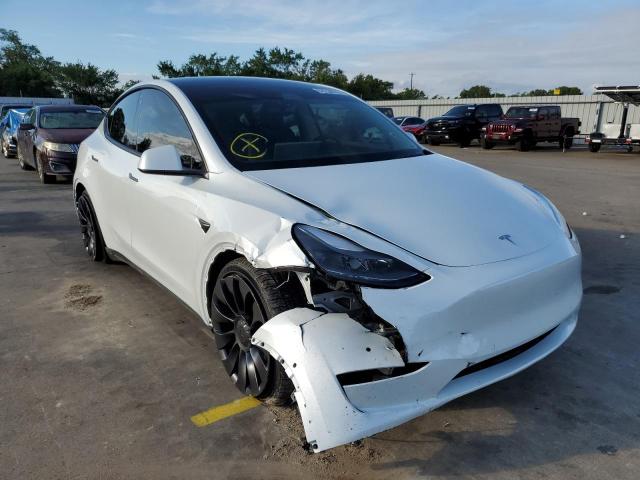 TESLA MODEL Y 2022 with VIN 7SAYGDEF5NF362176 - Photo from auction