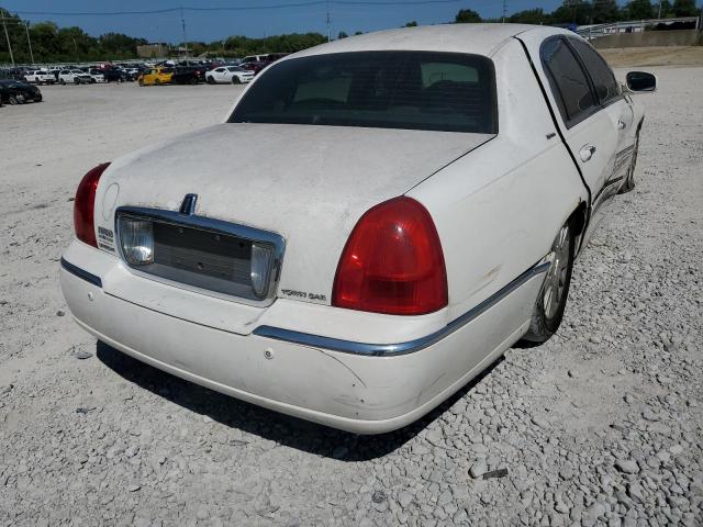 Photo 4 from auction – 2004 LINCOLN TOWN CAR E with VIN 1LNHM81W84Y632840