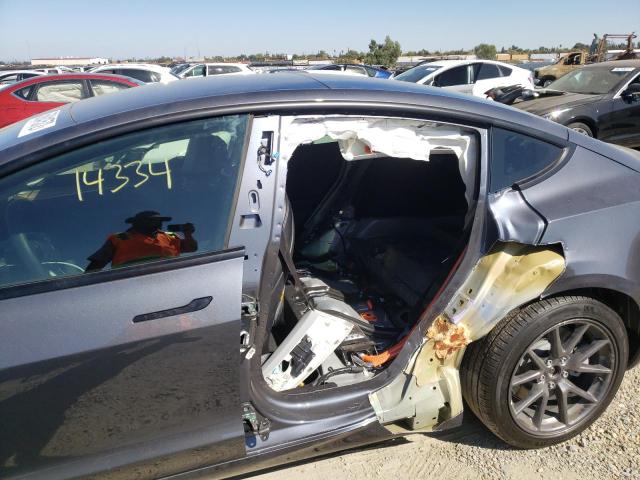 Photo 9 from auction – 2021 TESLA MODEL 3 with VIN 5YJ3E1EB5MF999043