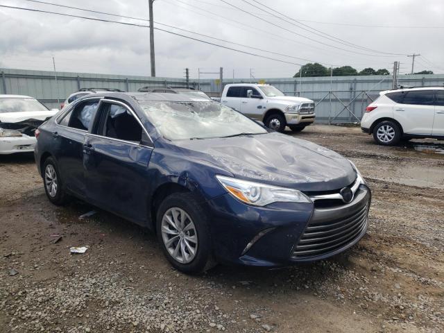 TOYOTA CAMRY LE 2017 with VIN 4T1BF1FK0HU697210 - Photo from auction