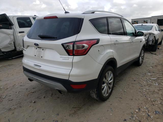 Photo 4 from auction – 2017 FORD ESCAPE TIT with VIN 1FMCU0J90HUD84473