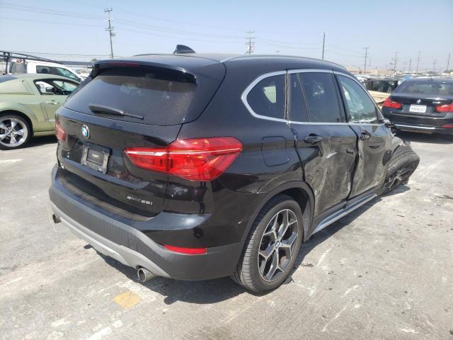 Photo 4 from auction – 2018 BMW X1 SDRIVE2 with VIN WBXHU7C30J5L06712
