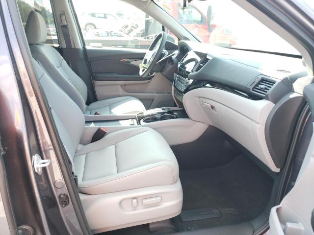 Photo 5 from auction – 2021 HONDA PILOT TOUR with VIN 5FNYF6H90MB060472