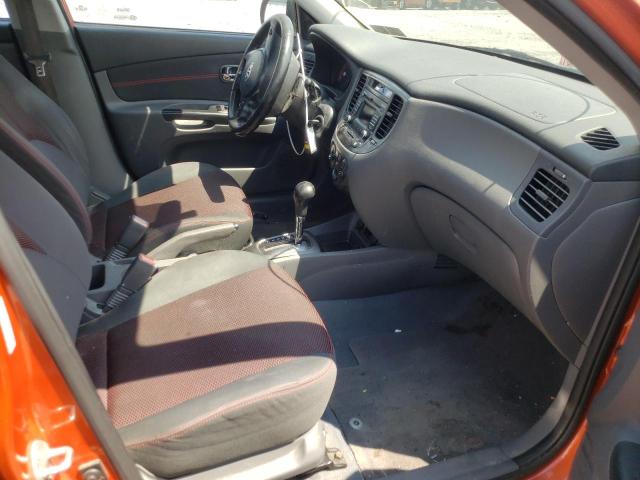 Photo 5 from auction – 2011 KIA RIO BASE with VIN KNADH4A30B6937812