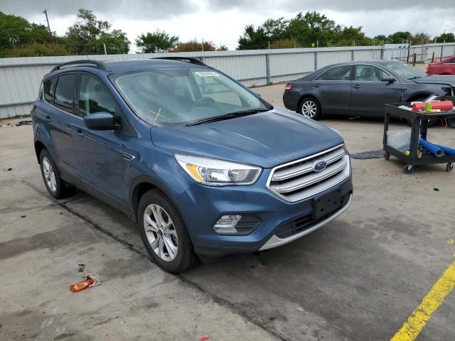 FORD ESCAPE SE 2018 with VIN 1FMCU9GD9JUC30432 - Photo from auction