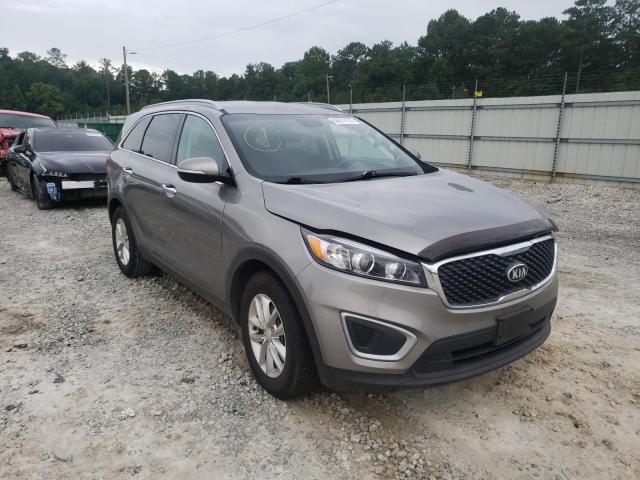 KIA SORENTO 2018 with VIN 5XYPG4A38JG399102 - Photo from auction