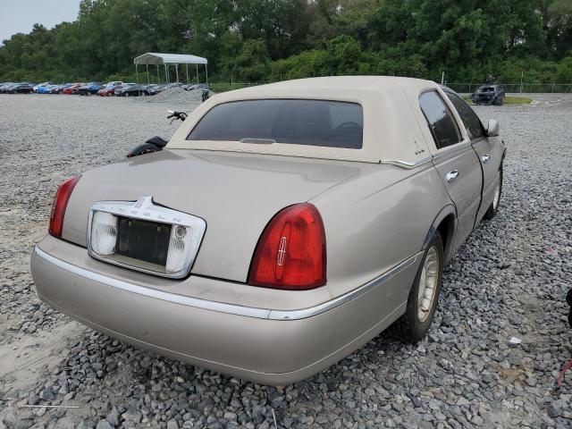 Photo 4 from auction – 2002 LINCOLN TOWN CAR E with VIN 1LNHM81W42Y637840
