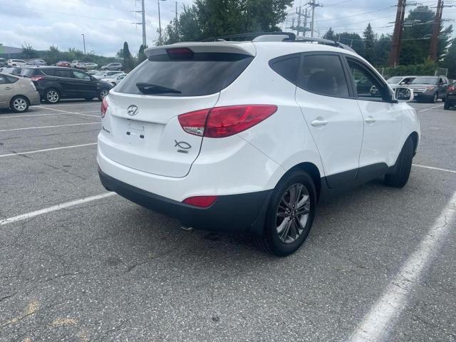 Photo 4 from auction – 2014 HYUNDAI TUCSON GLS with VIN KM8JUCAG2EU878465
