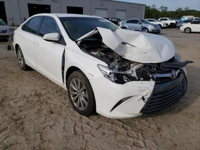 TOYOTA CAMRY LE 2015 with VIN 4T1BF1FK6FU893584 - Photo from auction
