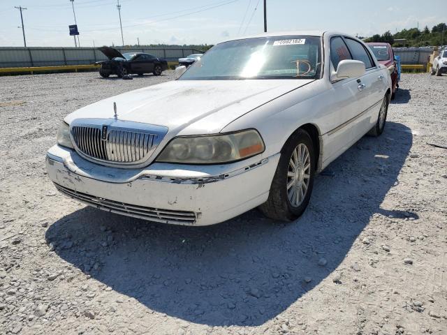 Photo 2 from auction – 2004 LINCOLN TOWN CAR E with VIN 1LNHM81W84Y632840