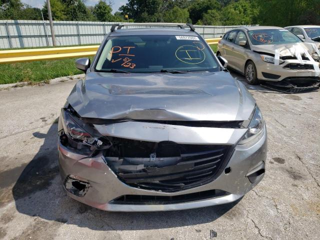 Photo 9 from auction – 2014 MAZDA 3 TOURING with VIN JM1BM1L71E1204190