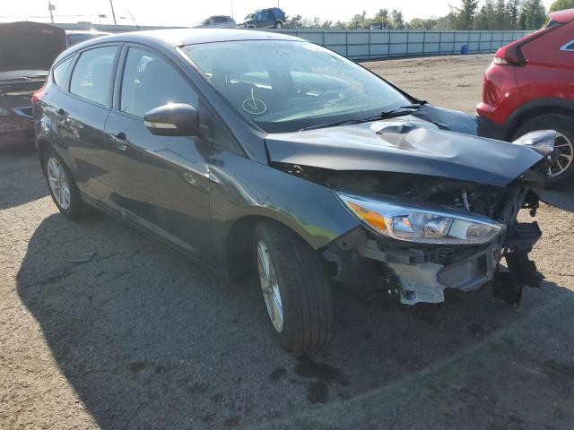 FORD FOCUS SE 2017 with VIN 1FADP3K21HL316889 - Photo from auction
