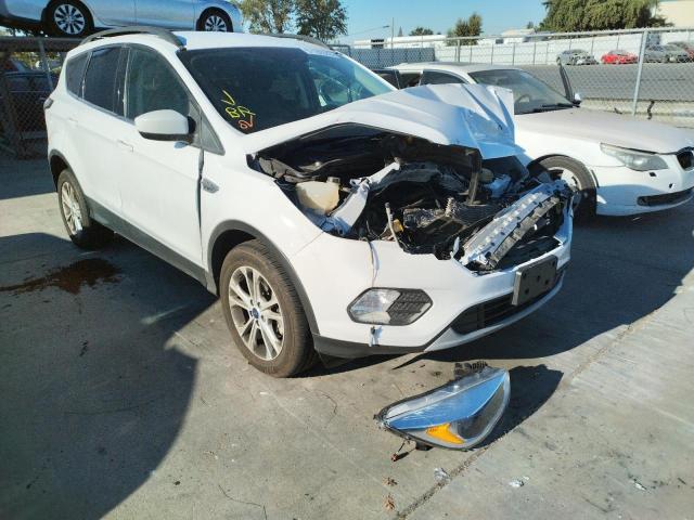FORD ESCAPE SE 2018 with VIN 1FMCU0GD1JUB84381 - Photo from auction