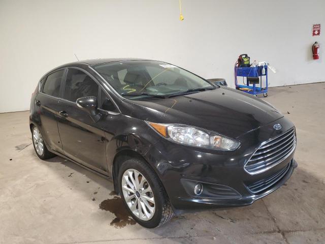 FORD FIESTA SE 2014 with VIN 3FADP4EJ9EM199324 - Photo from auction