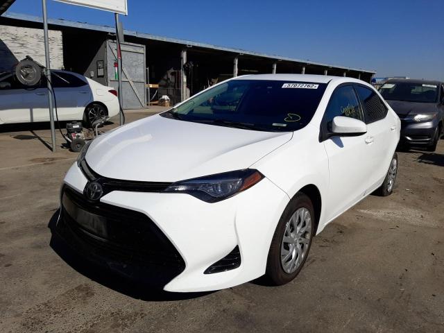 Photo 2 from auction – 2018 TOYOTA COROLLA L with VIN 5YFBURHE8JP745670