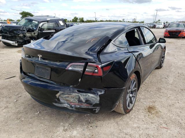 Photo 4 from auction – 2021 TESLA MODEL 3 with VIN 5YJ3E1EA5MF911664