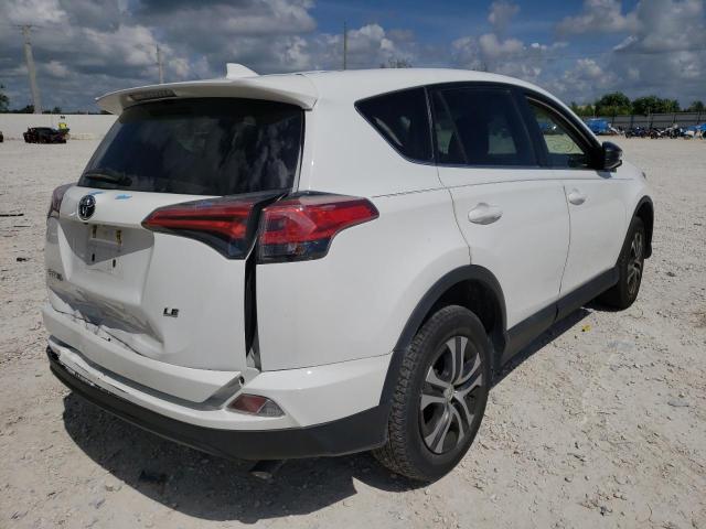 Photo 4 from auction – 2018 TOYOTA RAV4 LE with VIN 2T3ZFREV3JW451998