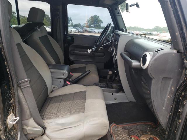 Photo 5 from auction – 2010 JEEP WRANGLER U with VIN 1J4BA5H18AL123345