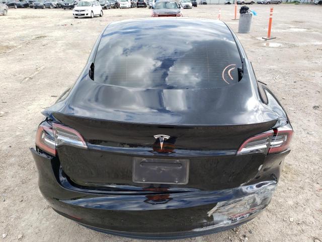 Photo 9 from auction – 2021 TESLA MODEL 3 with VIN 5YJ3E1EA5MF911664