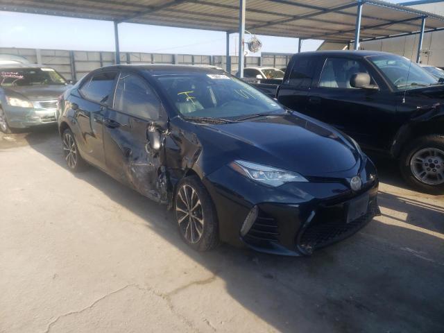TOYOTA COROLLA L 2017 with VIN 5YFBURHE5HP693067 - Photo from auction