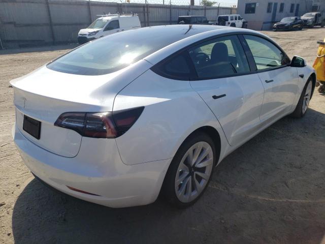 Photo 4 from auction – 2022 TESLA MODEL 3 with VIN 5YJ3E1EA4NF144133