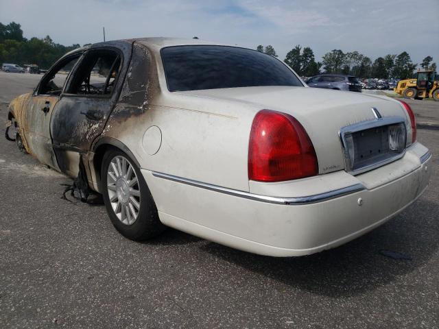 Photo 3 from auction – 2004 LINCOLN TOWN CAR U with VIN 1LNHM83W84Y614383