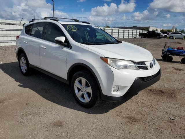 TOYOTA RAV4 XLE 2013 with VIN JTMWFREV6DD005669 - Photo from auction