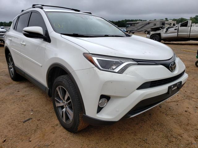 TOYOTA RAV4 XLE 2016 with VIN JTMWFREVXGJ064049 - Photo from auction