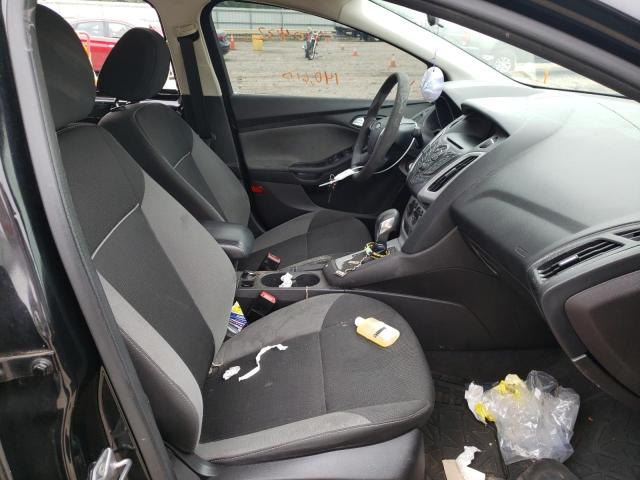 Foto 5 de la subasta – 2014 FORD FOCUS SE con VIN 1FADP3F20EL204719