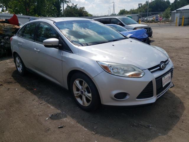FORD FOCUS SE 2014 with VIN 1FADP3F24EL242101 - Photo from auction