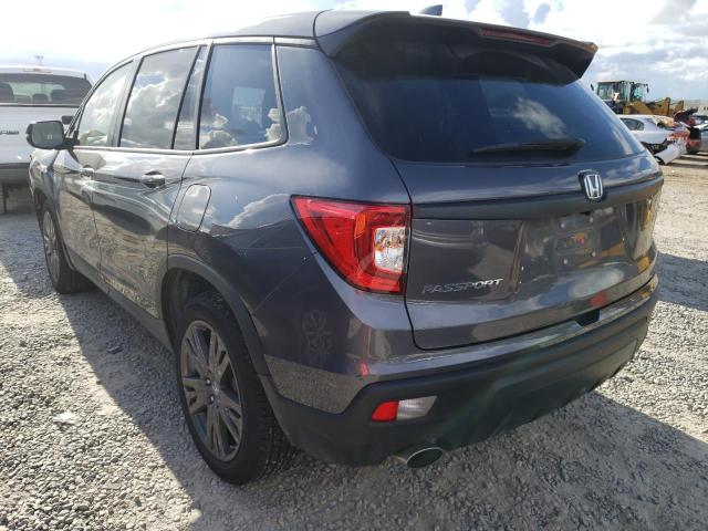 Photo 3 from auction – 2021 HONDA PASSPORT E with VIN 5FNYF7H56MB013000