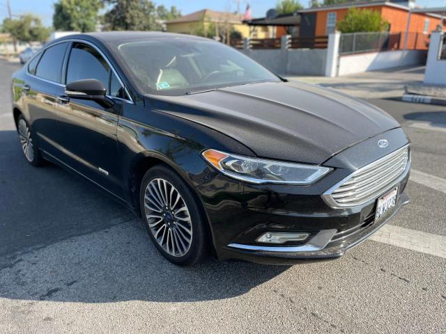 FORD FUSION SE 2018 with VIN 3FA6P0PU2JR131047 - Photo from auction