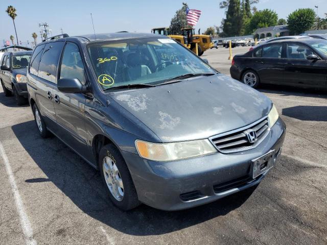 HONDA ODYSSEY EX 2004 with VIN 5FNRL18924B008311 - Photo from auction