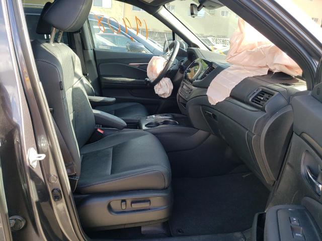 Photo 5 from auction – 2021 HONDA PASSPORT E with VIN 5FNYF7H56MB013000