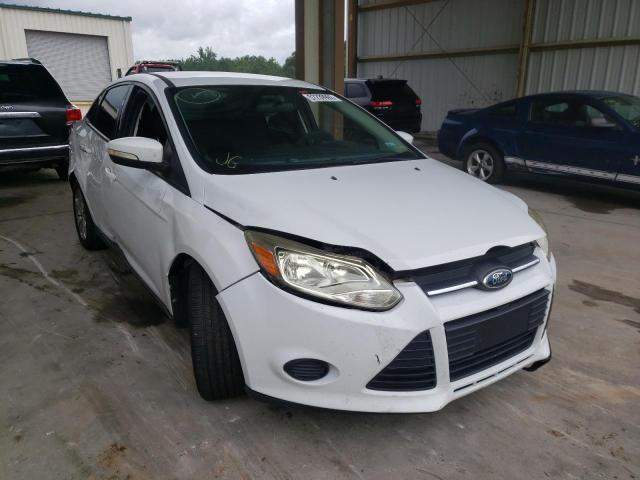 FORD FOCUS SE 2014 with VIN 1FADP3F20EL272681 - Photo from auction
