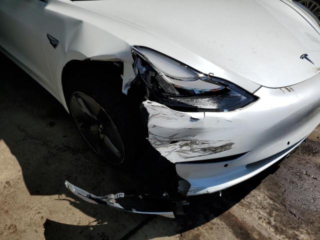 Photo 9 from auction – 2019 TESLA MODEL 3 with VIN 5YJ3E1EB9KF213600