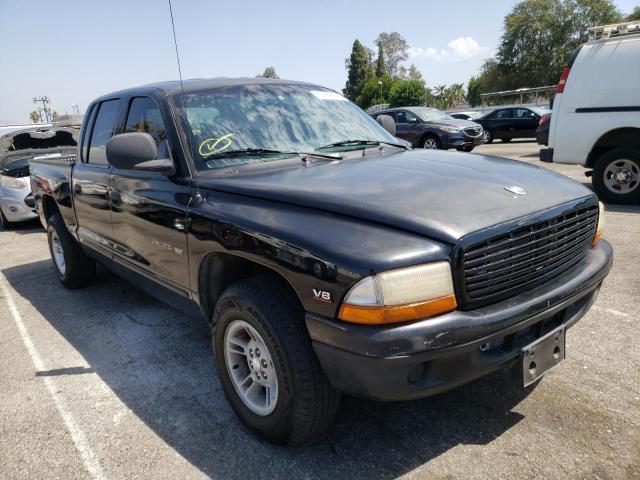 DODGE DAKOTA QUA 2000 with VIN 1B7GL2AN0YS734214 - Photo from auction