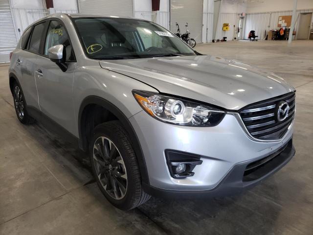 MAZDA CX-5 2016 with VIN JM3KE4DY8G0749132 - Photo from auction