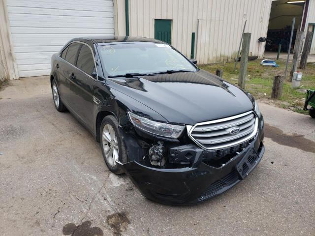 FORD TAURUS SEL 2014 with VIN 1FAHP2E8XEG145916 - Photo from auction