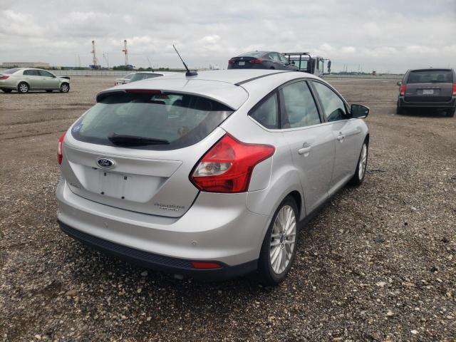 Photo 4 from auction – 2014 FORD FOCUS TITA with VIN 1FADP3N22EL130298