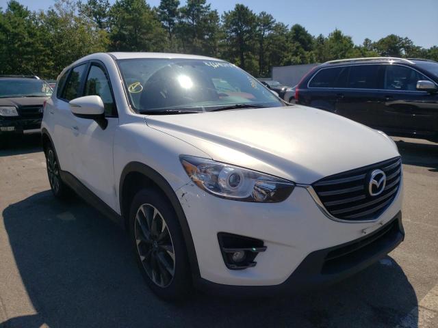 MAZDA CX-5 2016 with VIN JM3KE4DY9G0890985 - Photo from auction