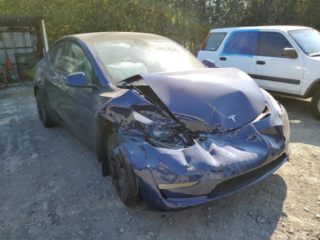 TESLA MODEL Y 2022 with VIN 7SAYGDEF9NF465424 - Photo from auction