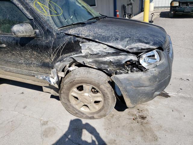 Photo 9 from auction – 2003 FORD ESCAPE XLT with VIN 1FMYU93133KD92735