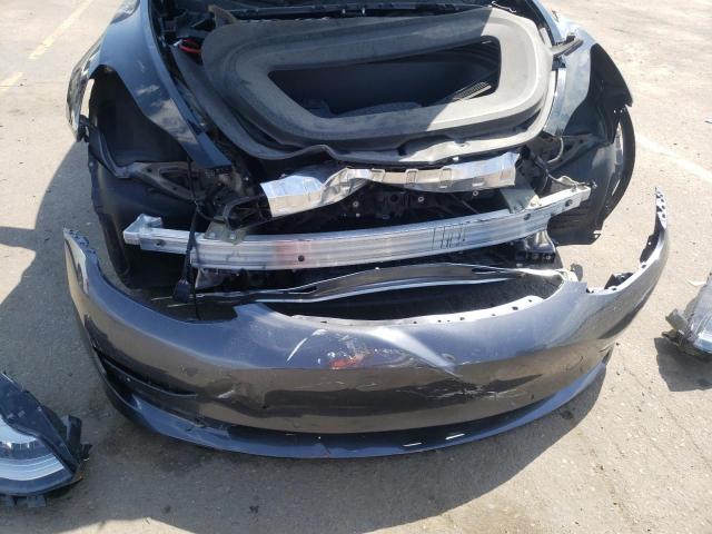 Photo 9 from auction – 2021 TESLA MODEL Y with VIN 5YJYGDEE0MF255359