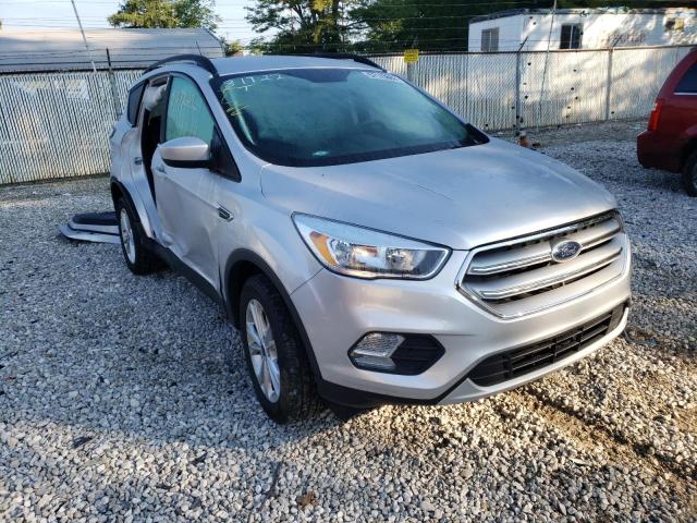 FORD ESCAPE SE 2018 with VIN 1FMCU9GD8JUC17638 - Photo from auction